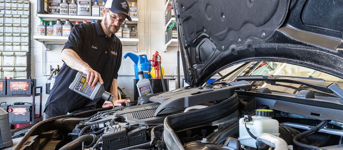 Changing oil at a quick lube.
